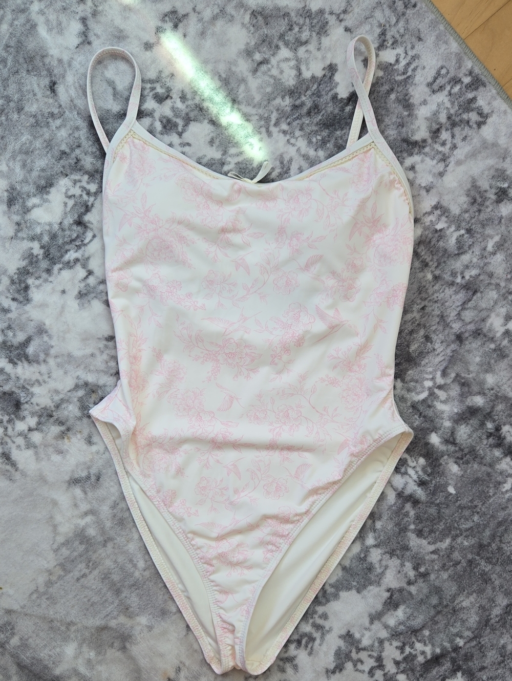 Dippin' Daisy's White One-Piece Swimsuit with Pale Pink Floral Print